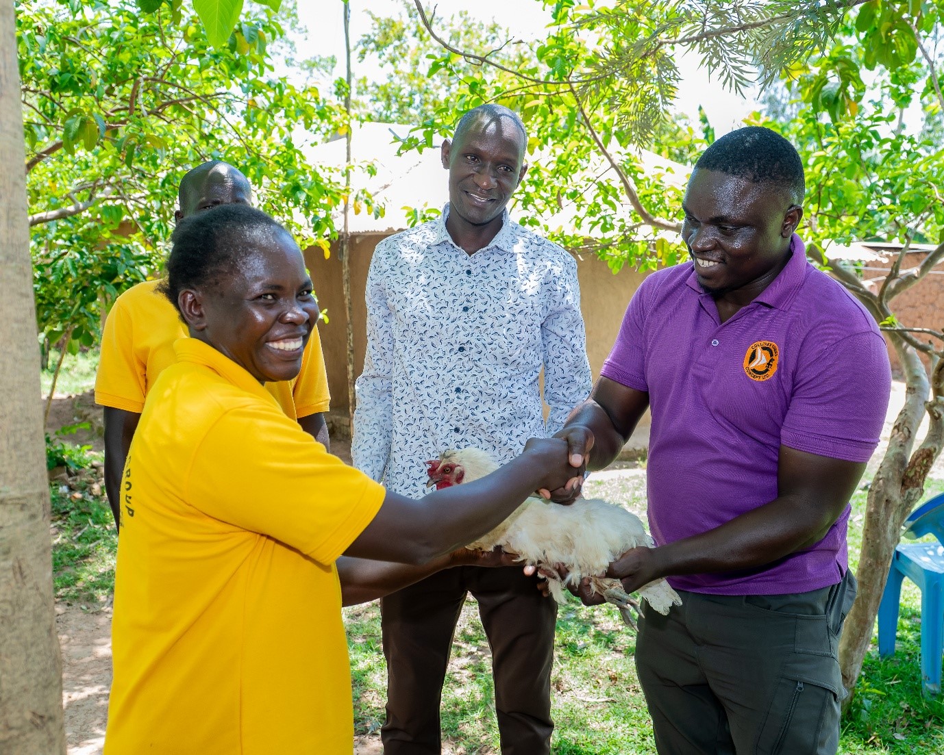 Farmers from Ochude Union Self Help Group gifting chicken to the production team